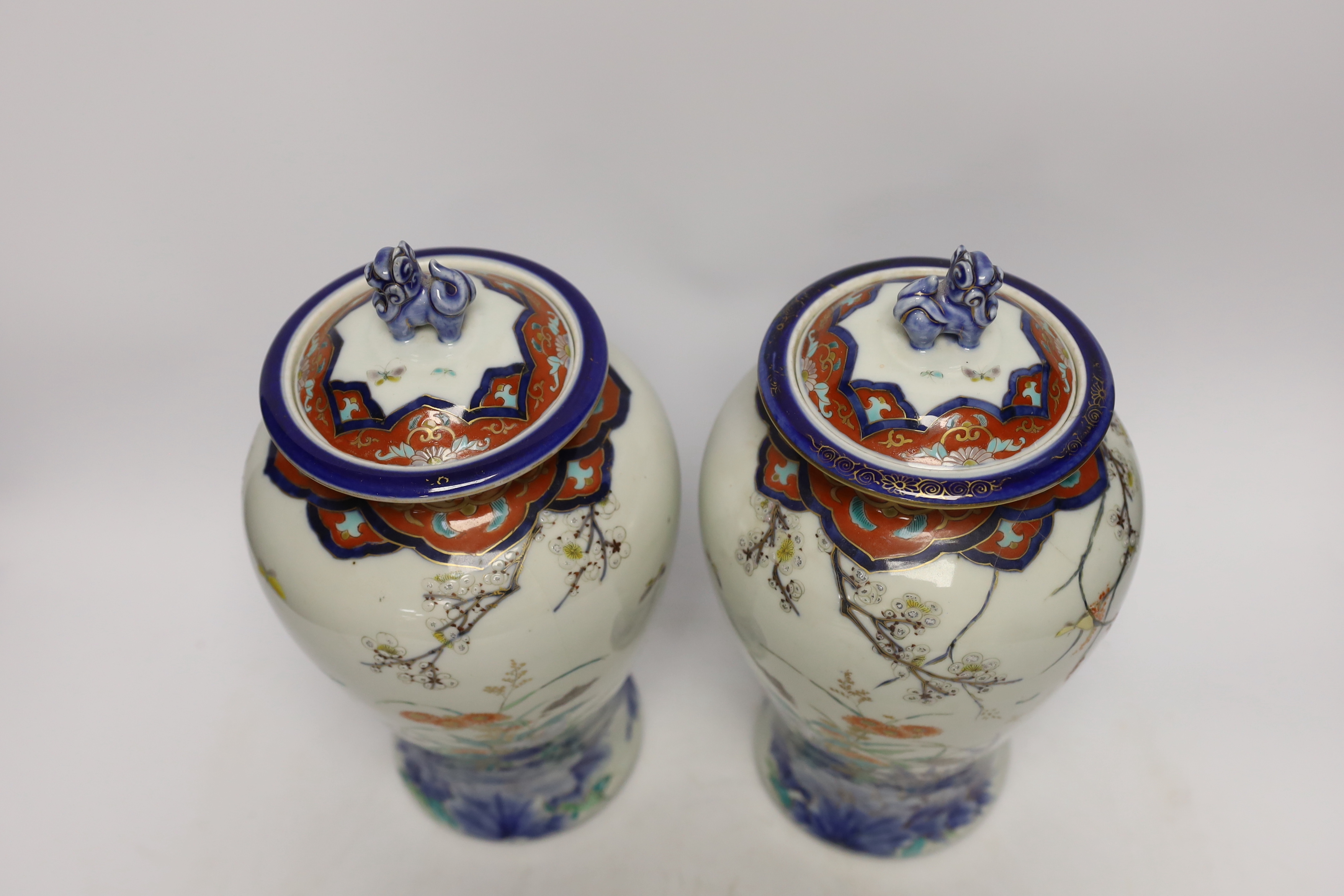 A pair of Japanese Imari vases and covers, by Fukugawa, koransha mark, 32cm high